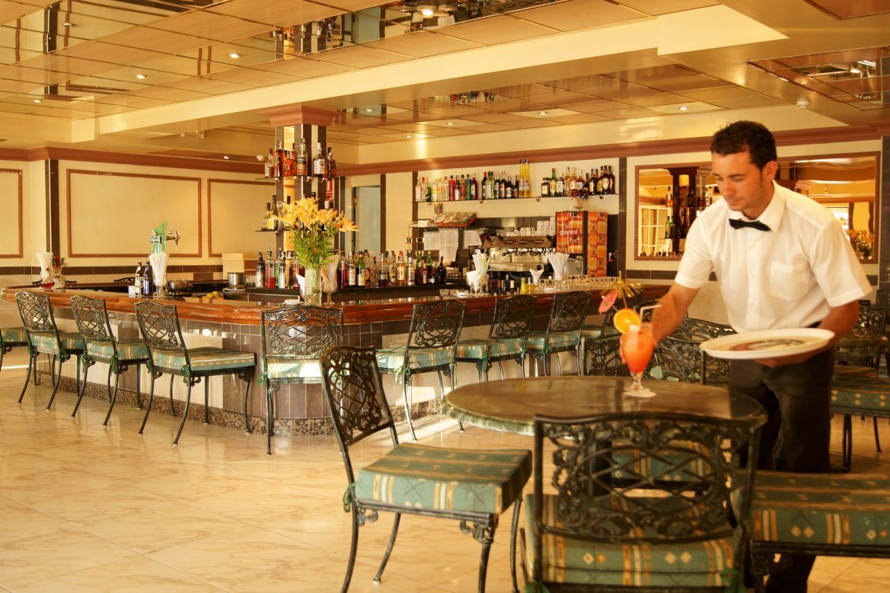 โรงแรมตริอังฟลอร์ ปูแอร์โตเดลาครูซ ภายนอก รูปภาพ